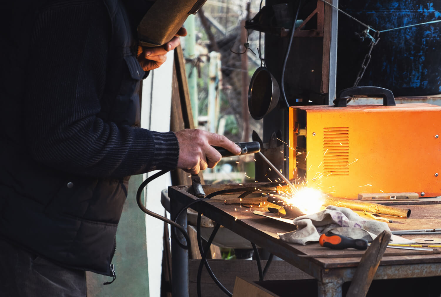 Certified welder working on metal fabrication